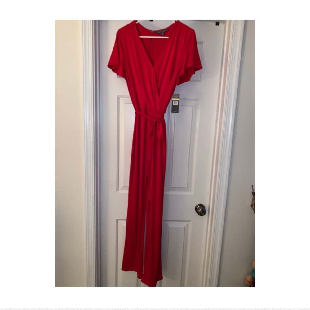 Red Romper with tie waist.